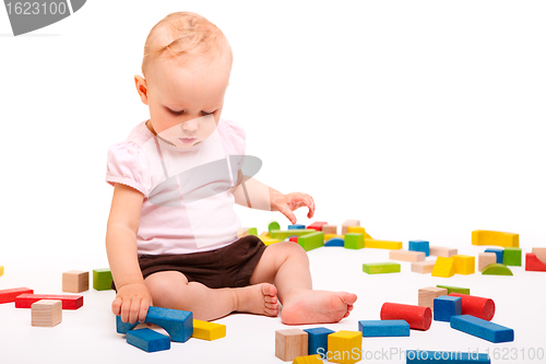 Image of Girl playing with blocks