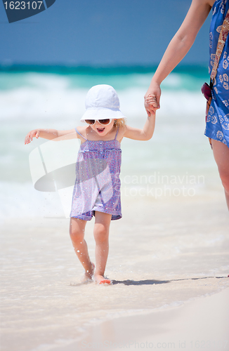 Image of Little cute girl at beach