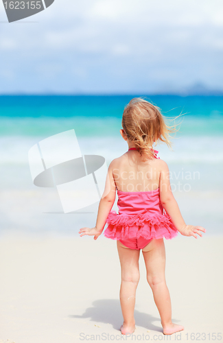 Image of Little girl on tropical beach