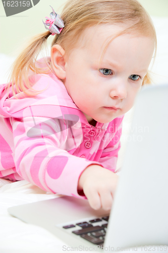 Image of Little girl with laptop