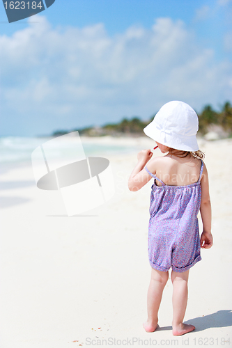 Image of Little cute girl at beach