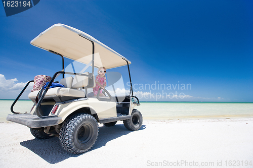 Image of Golf cart at tropical beach