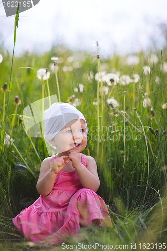 Image of Little girl in meadow