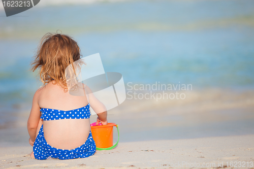 Image of Adorable little girl at beach