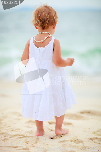 Image of Toddler girl at seashore