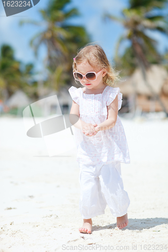 Image of Little cute girl at beach
