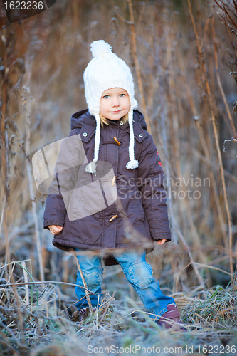Image of Little girl outdoors on winter day