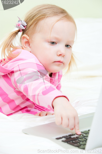 Image of Little girl with laptop