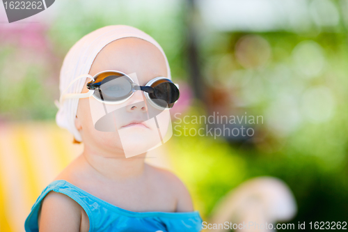Image of Little girl in swimming glasses
