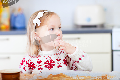 Image of Little girl at kitchen