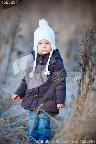 Image of Little girl outdoors on winter day