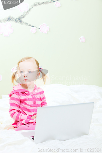 Image of Little girl with laptop