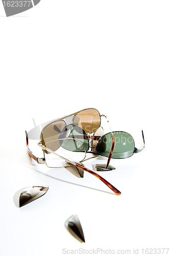 Image of Broken sunglasses. Copyspace