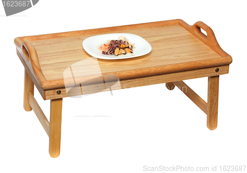 Image of plate with seafood on wooden table