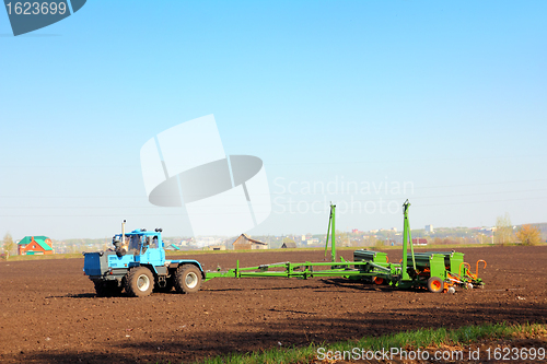 Image of agriculture tractor with drill