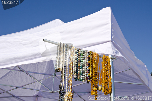 Image of fair market sell necklaces jewelry. Amber gems 