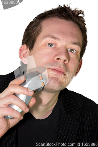 Image of Man shaving