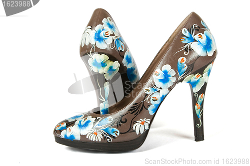 Image of high heels shoes with printed flower