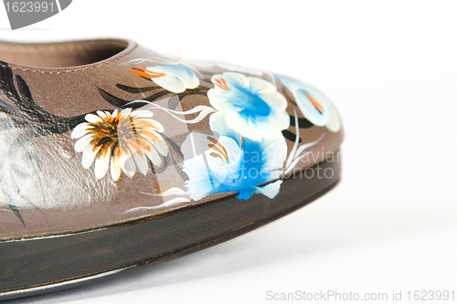 Image of high heels shoes with printed flower