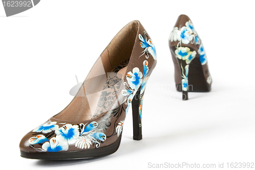 Image of high heels shoes with printed flower