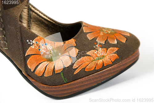 Image of high heels shoes with printed flower