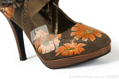 Image of high heels shoes with printed flower