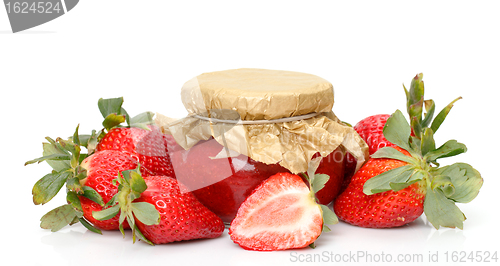 Image of Fresh Strawberries with jam-jar closeup