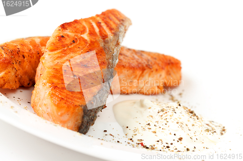 Image of Fried salmon fillets with sauce