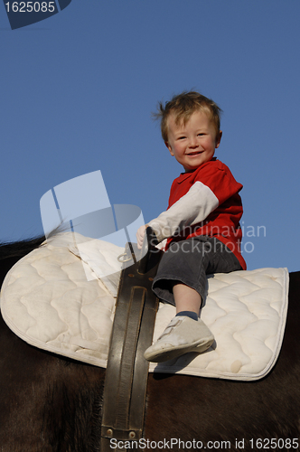 Image of riding little boy