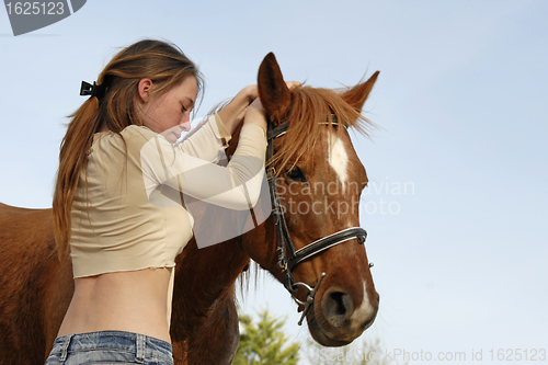 Image of teen and horse