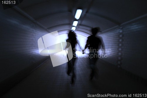 Image of Two people in a tunnel