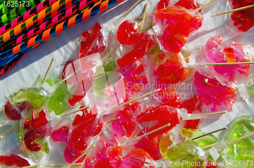 Image of Various forms sucked lollipops sweets sold  fair 
