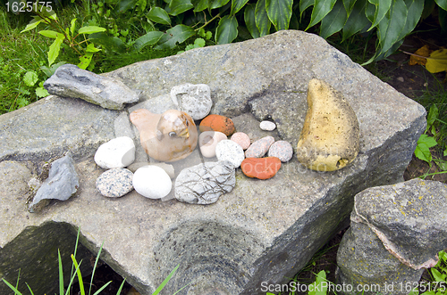 Image of Ancient retro rock stone garden figure bird 