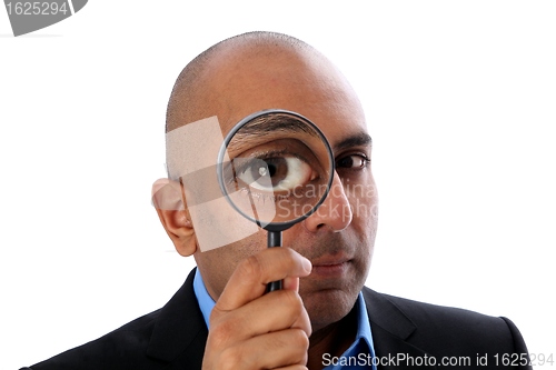 Image of Man with magnifying glass