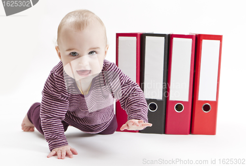 Image of young child with ring file