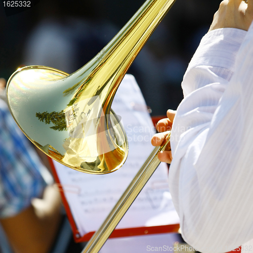 Image of Musician playing the trumpet in the Orchestra