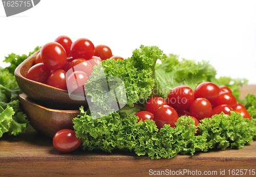 Image of Tomatoes And Salad Leaves