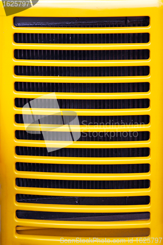 Image of Yellow radiator grill