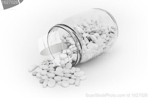 Image of pills in glass container