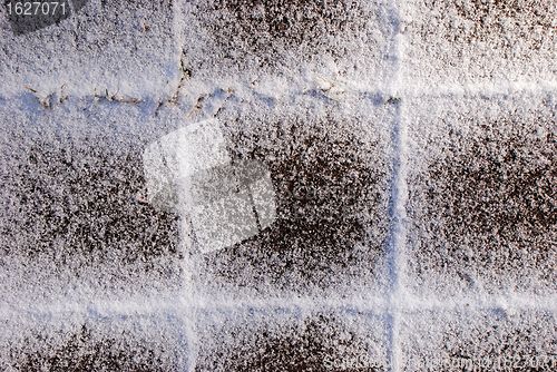 Image of Snow-covered tiles 