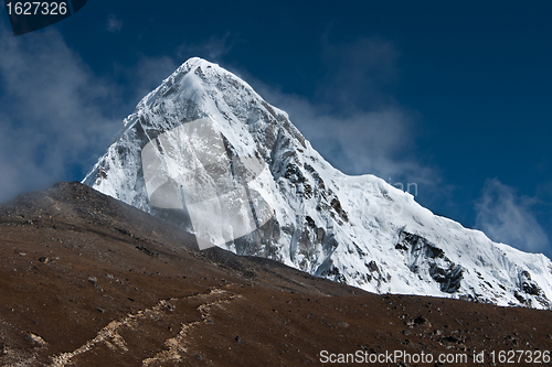 Image of Pumori, Kala Patthar and cloudy sky in Himalayas