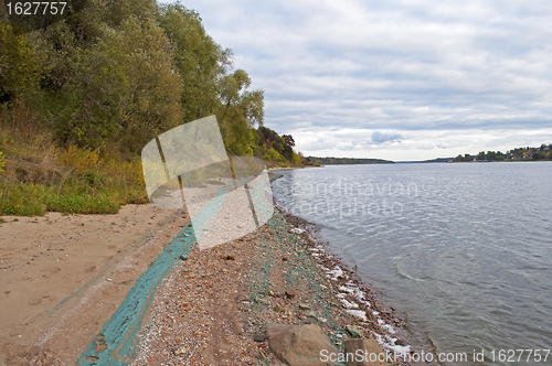 Image of Chemical waste on the riverbank