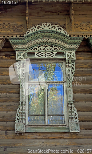 Image of Old wooden window with carved decoration