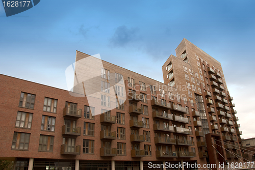 Image of Large Red Apartment Block