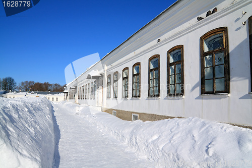 Image of stone townhouse in deep snow