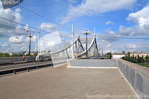 Image of town bridge through small river