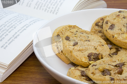 Image of Bowl of cookies and book