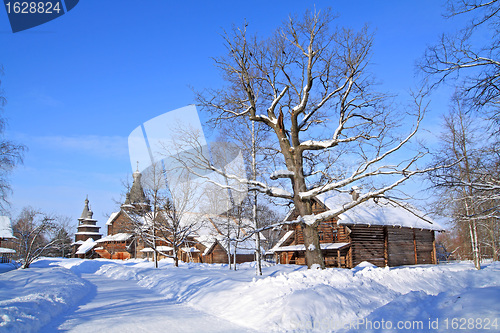 Image of wooden chapel in winter village