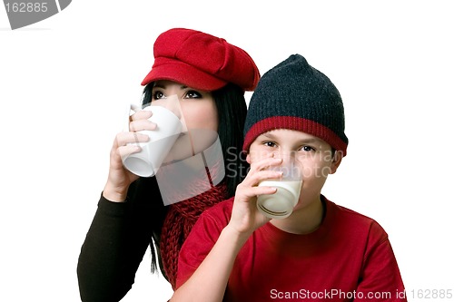 Image of Two people drinking beverages