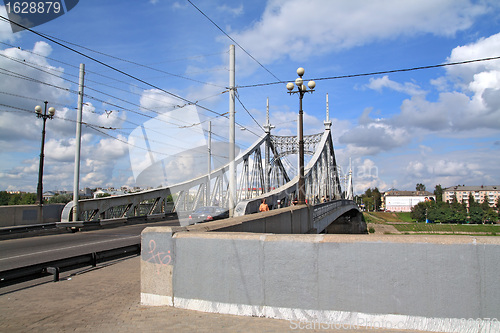 Image of town bridge through small river